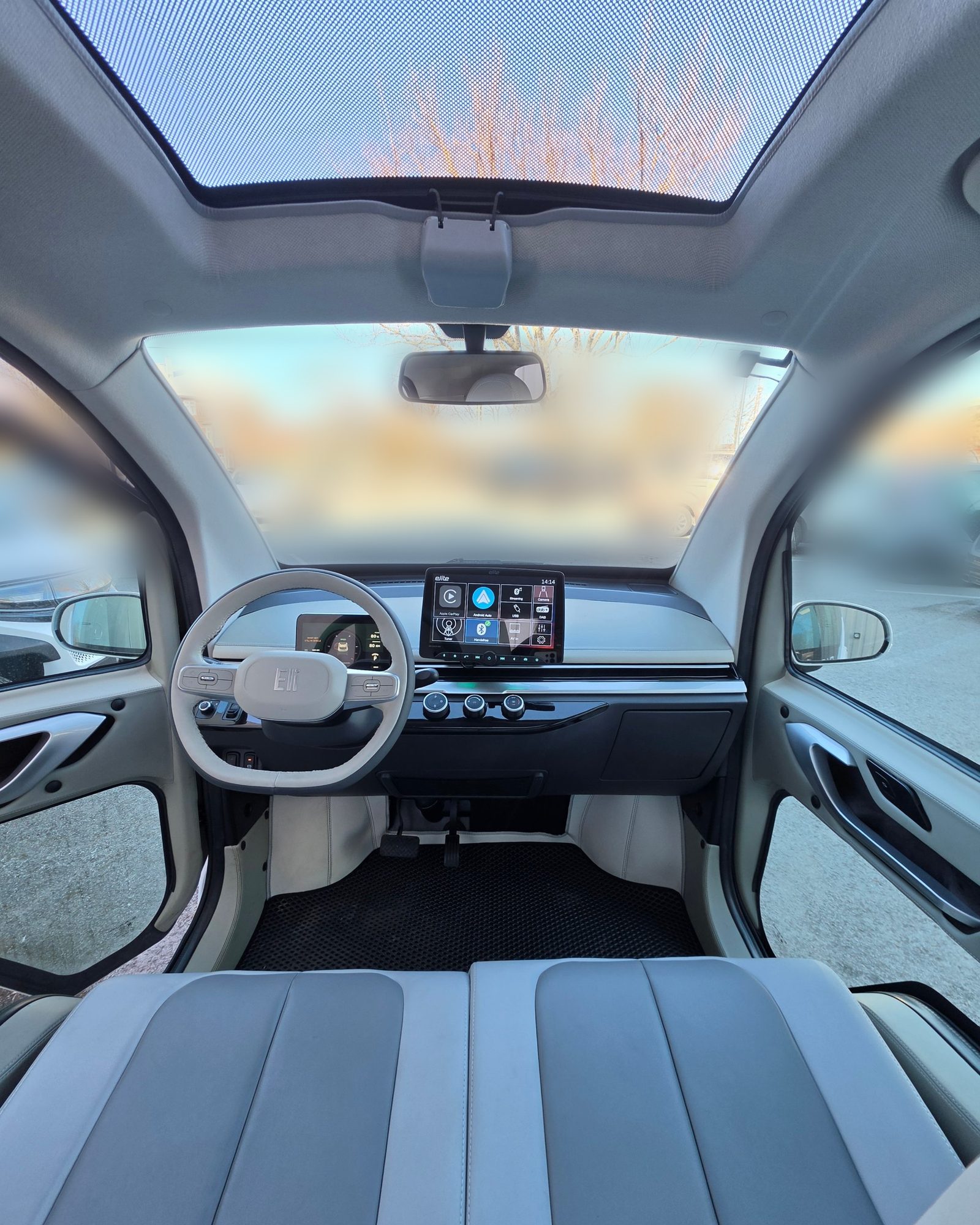 Eli ZERO Premium interior with sunroof and dashboard